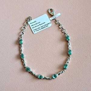 AAA Emerald & Natural White Zircon Infinity Style Bracelet